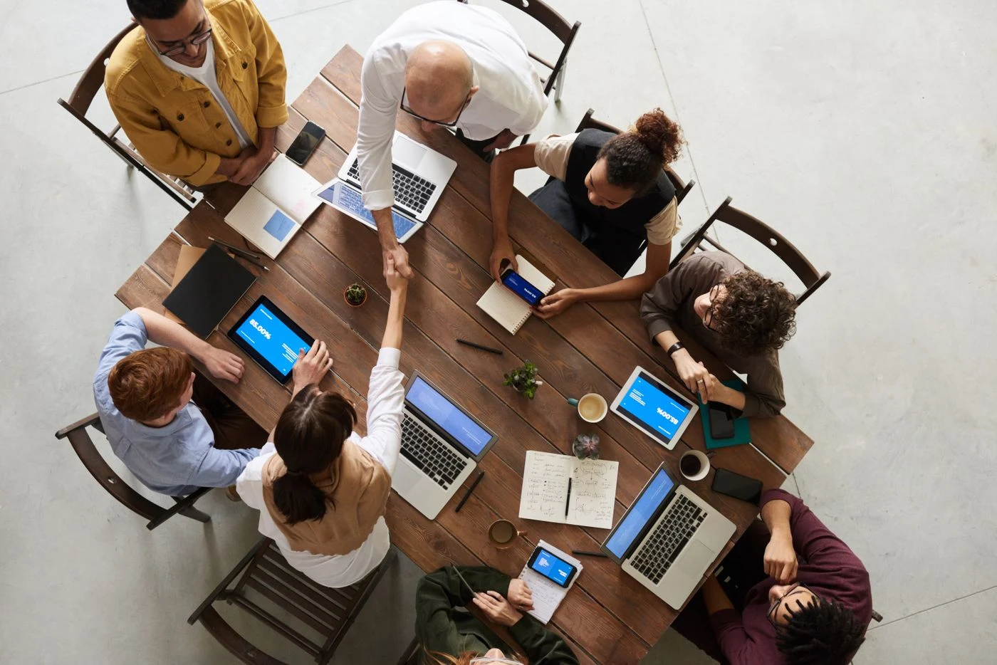A small business team meeting around a table